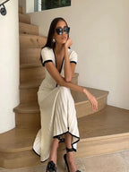 Witte V-Hals Crop Top & Plissé Midi Rok Set