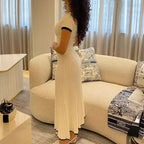 Witte V-Hals Crop Top & Plissé Midi Rok Set